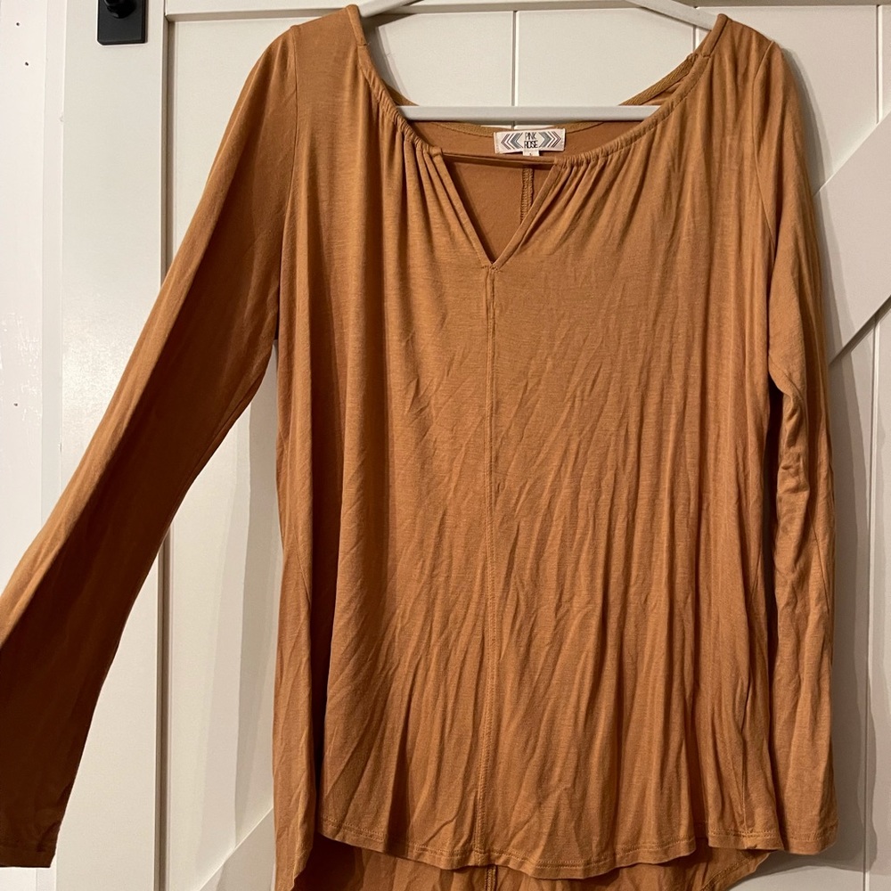Boho styled long sleeve rust colored